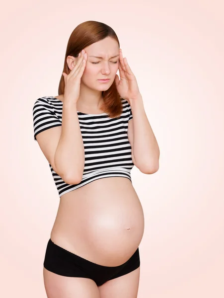 Stres na těhotnou ženu, s bolestí hlavy — Stock fotografie