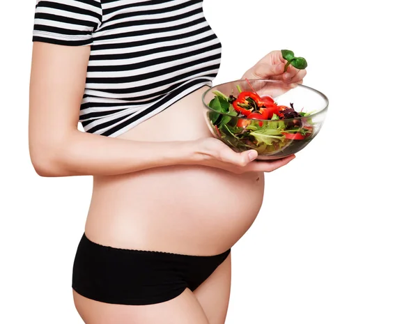 野菜のボウルで妊娠中の女性 — ストック写真