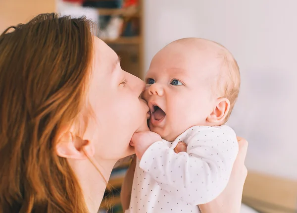 Tender mother and cute baby at home — Stock Photo, Image