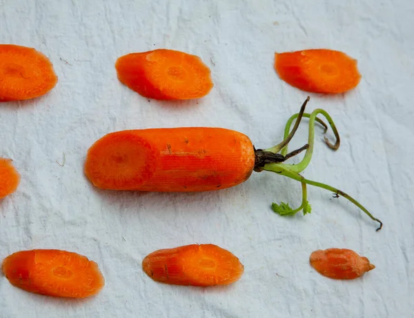 Carrots on a white background.Vitamins in the basket. apple, lemon, carrot.pumpkin