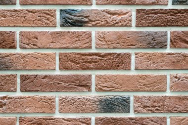 Duvardaki kaldırım taşları arkaplanı kapatın