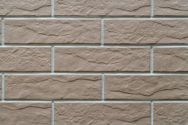 Duvardaki kaldırım taşları arkaplanı kapatın