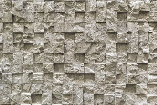 Duvarın duvarları kaldırım taşlarını yakın plan olarak kullanıyor.