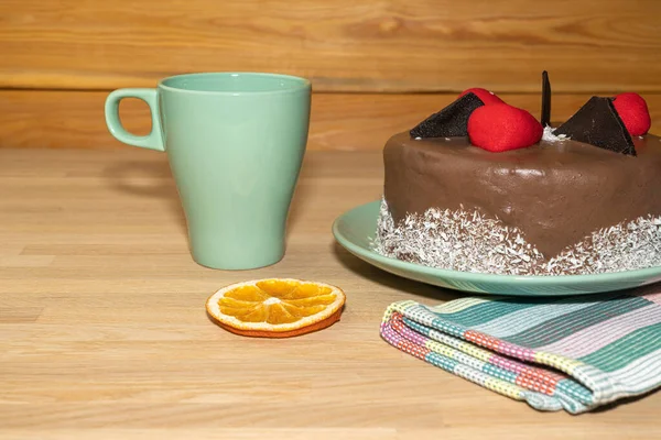 Chocolate cake on the table on a light background — Stock Photo, Image