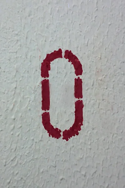 Czerwona Cyfra Zero Malowanej Ścianie — Zdjęcie stockowe
