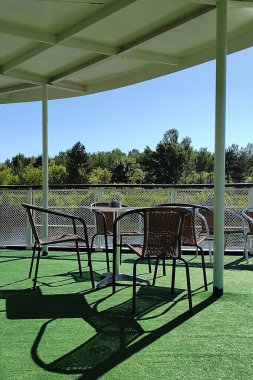 chairs at the stern of the tourist ship
