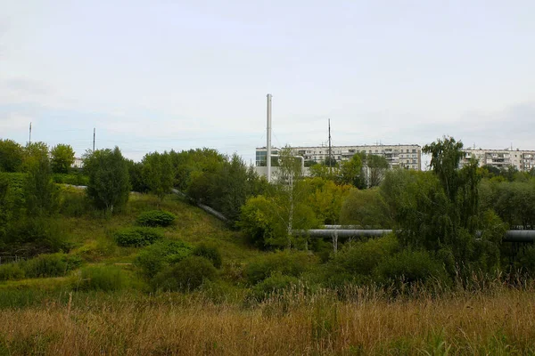 boiler house with a pipeline on the city outskirts