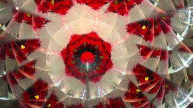 Kaleydoskop görüntüsü. Kırmızı, beyaz ve sarı arkaplan