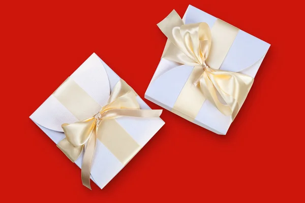 Two boxes with gold bow — Stock Photo, Image