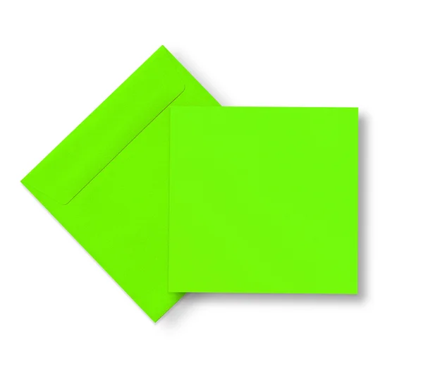 Enveloppe verte et carte sur blanc — Photo