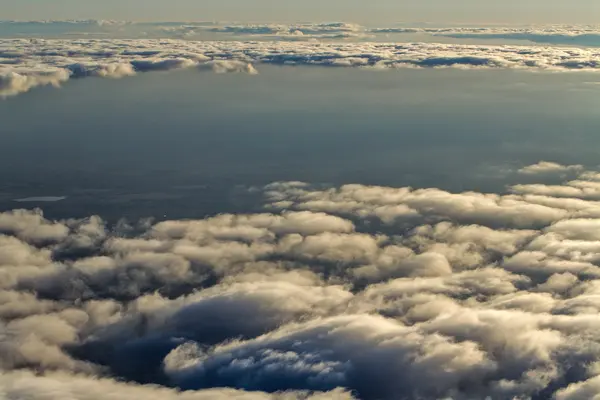 Clouds from the altitude of the aircraft.