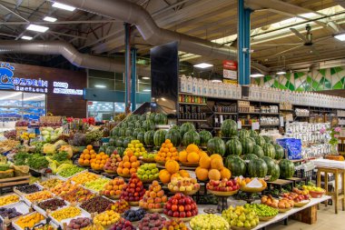 Baku, Azerbaijan. Traditional fruits and vegetables at Yashil Bazar in Baku. This is one of the most popular and colorful markets in the city, known for its wide selection of fresh produce.