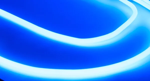 Modré neonové světlo pozadí — Stock fotografie