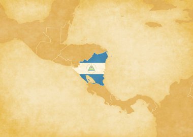 Nikaragua bayrağı eski bir kağıt üzerinde Orta Amerika 'nın eski bir retro haritasında.