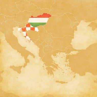 Macaristan ve Hırvatistan, eski antika kağıt üzerinde Balkanlar 'ın ocher retro haritasında bayrağı boyadı.