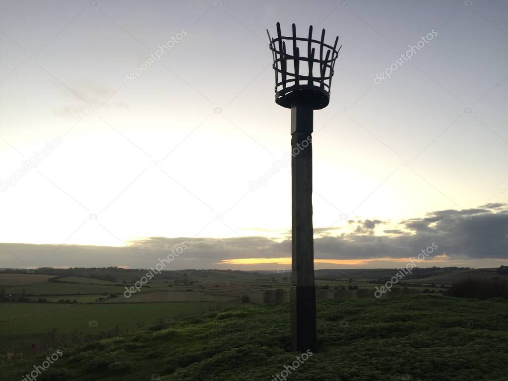 Beacons or fire beacon are a warning signal system of historical Uk lit on hills in coastal areas of England and Scotland to signal invading lit in medieval