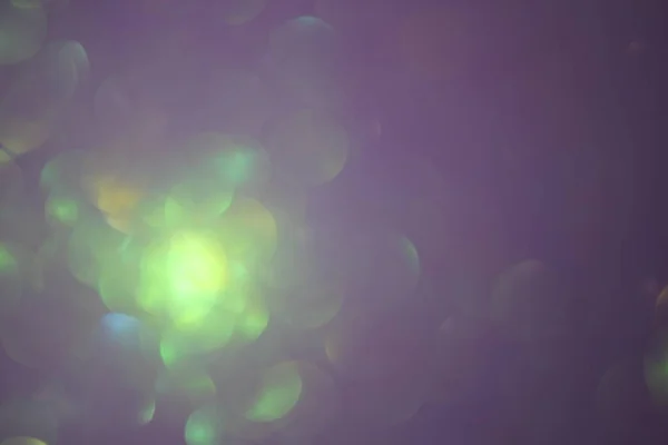 glitter sparkle bokeh iridescent background with copy space