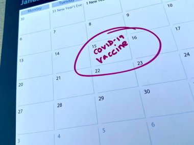 covid-19 Coronavirus aşı randevusu takvimde, covid için aşı aşıları İngiltere 'de dağıtılacak.