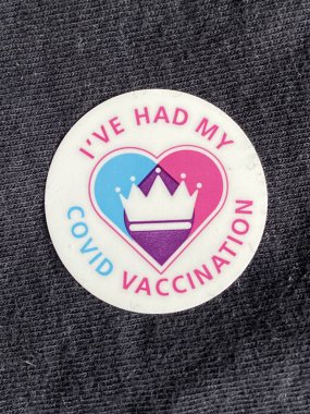 London, United Kingdom, March 02 2021: Vaccination programme NHS Sticker received after successful covid19 vaccination