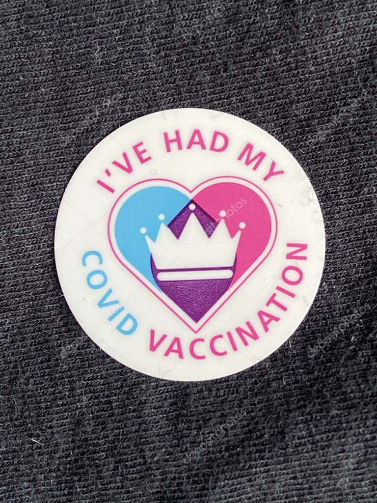 London, United Kingdom, March 02 2021: Vaccination programme NHS Sticker received after successful covid19 vaccination