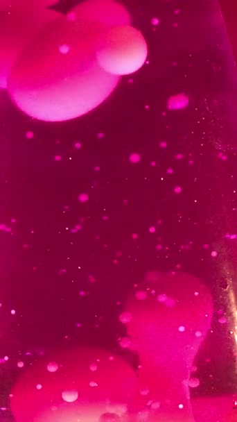 溶岩ランプクローズアップ70年代スタイルピンク溶岩ランプ液体背景ストック映像とともにコピースペース — ストック動画