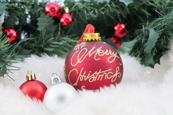 Christmas balls on abstract snow background — Stock Photo, Image