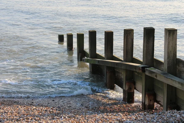 Vieux brise-eau groin mur de mer — Photo