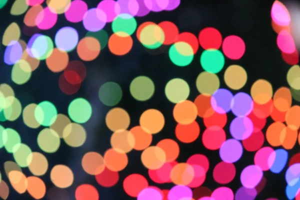 Abstracte Bokeh kerst lichtkringen — Stockfoto