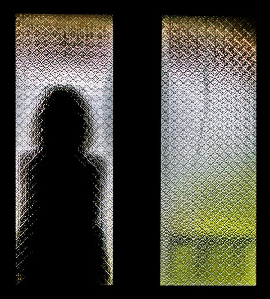 Silhouette of Lonely Woman Stock Picture