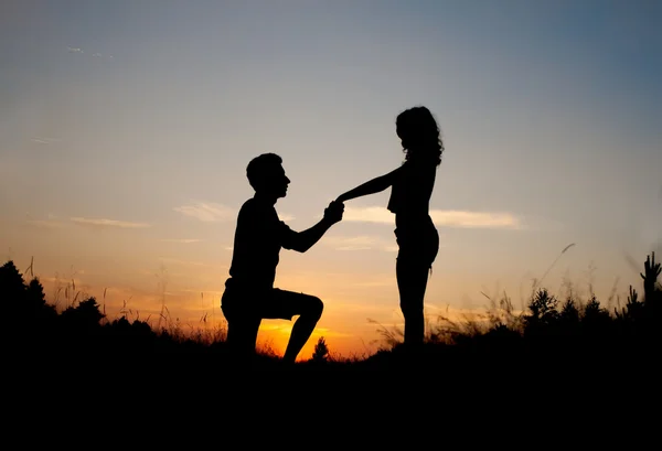 Huwelijk voorstel zonsondergang Stockfoto