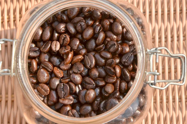 Coffee beans in the bottle — Stock Photo, Image