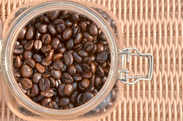 Coffee beans in the bottle — Stock Photo, Image