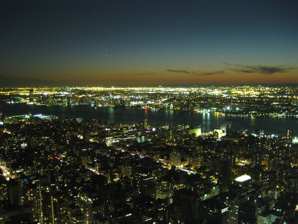 Night over illuminated Manhattan in New York