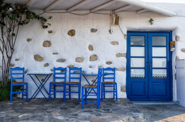 Facade of a small traditional tavern in Ano Koufonisi, Cyclades, Greece clipart
