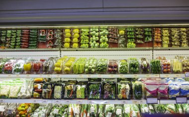 Shopping in the supermarket for health a shopping shelf vegetable and fruit put on them at food in the supermarket.