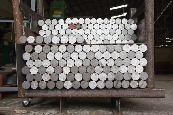 Carbon steel bars deposited in stacks