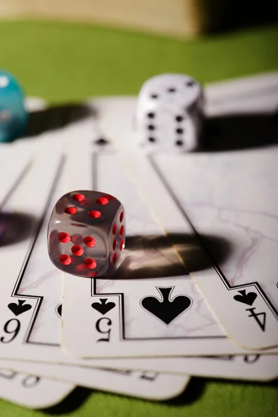 Transparent dice on playing cards — Stock Photo, Image