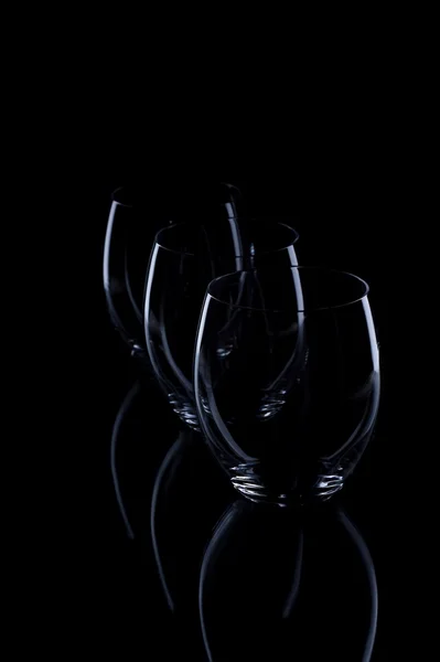 Trois verres sur fond noir — Photo