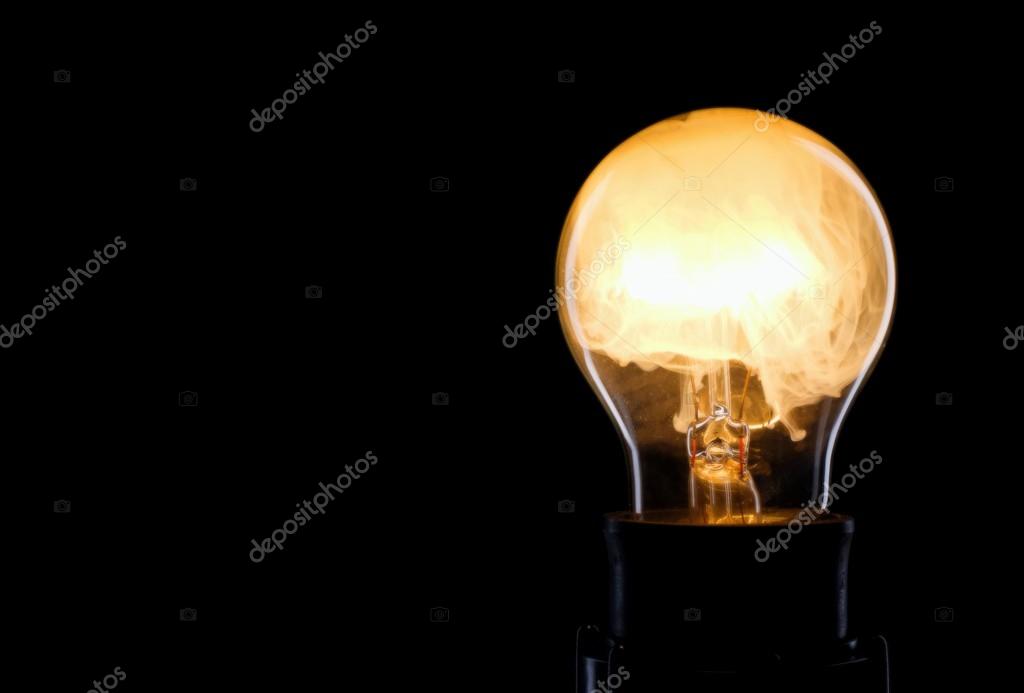 O fio em uma lâmpada queimada — Fotografias de Stock