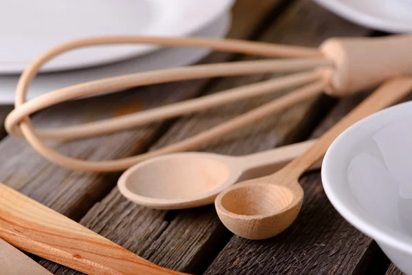 Couple of wooden spoons on a table — Stock Photo, Image