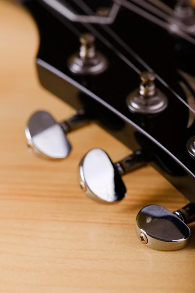 Parte de la cabeza de guitarra negra — Foto de Stock