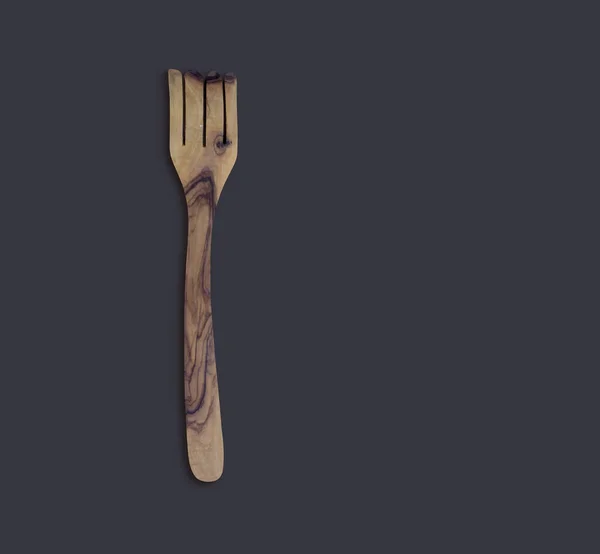 Top View Olive Wooden Cook Serve Fork Isolated Dark Background — Stok fotoğraf