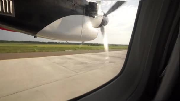 Take off into the sky commercial screw aircraft. View from window. — Stock Video