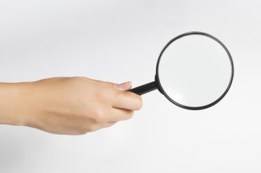 Büyüteç camı, bir elinde Büyüteç