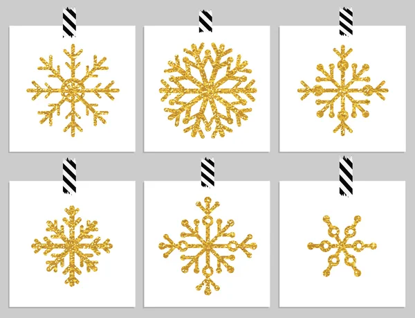 Set of gold textured snowflakes on cards — Stock Vector