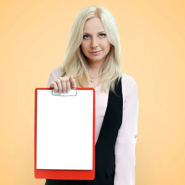 Successful businesswoman holding a clipboard with blank paper on — Stock Photo, Image