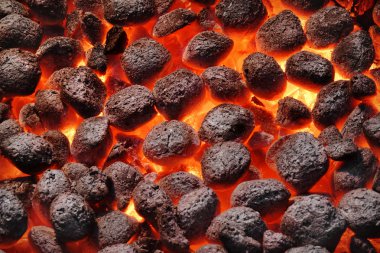 BBQ Grill Pit With Glowing Hot Charcoal Briquettes, Closeup clipart