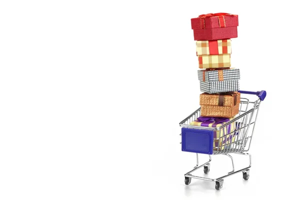 Shopping Cart With Stack Of Gift Boxes Isolated On White — 图库照片