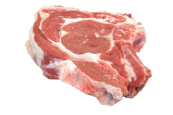 Einzelne rohe Rindfleisch Ribeye Steak isoliert auf weiß, Overhead, closeu — Stockfoto
