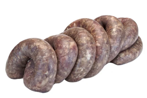 Alcuni crudi Bratwurst in involucro naturale isolato su bianco — Foto Stock